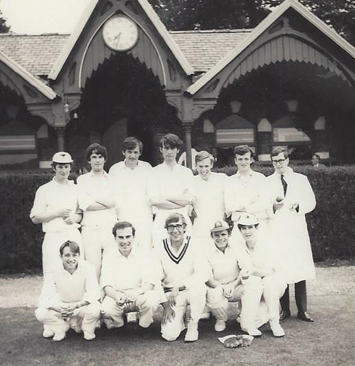 Black and white 60s image of a cricket team in their whites.