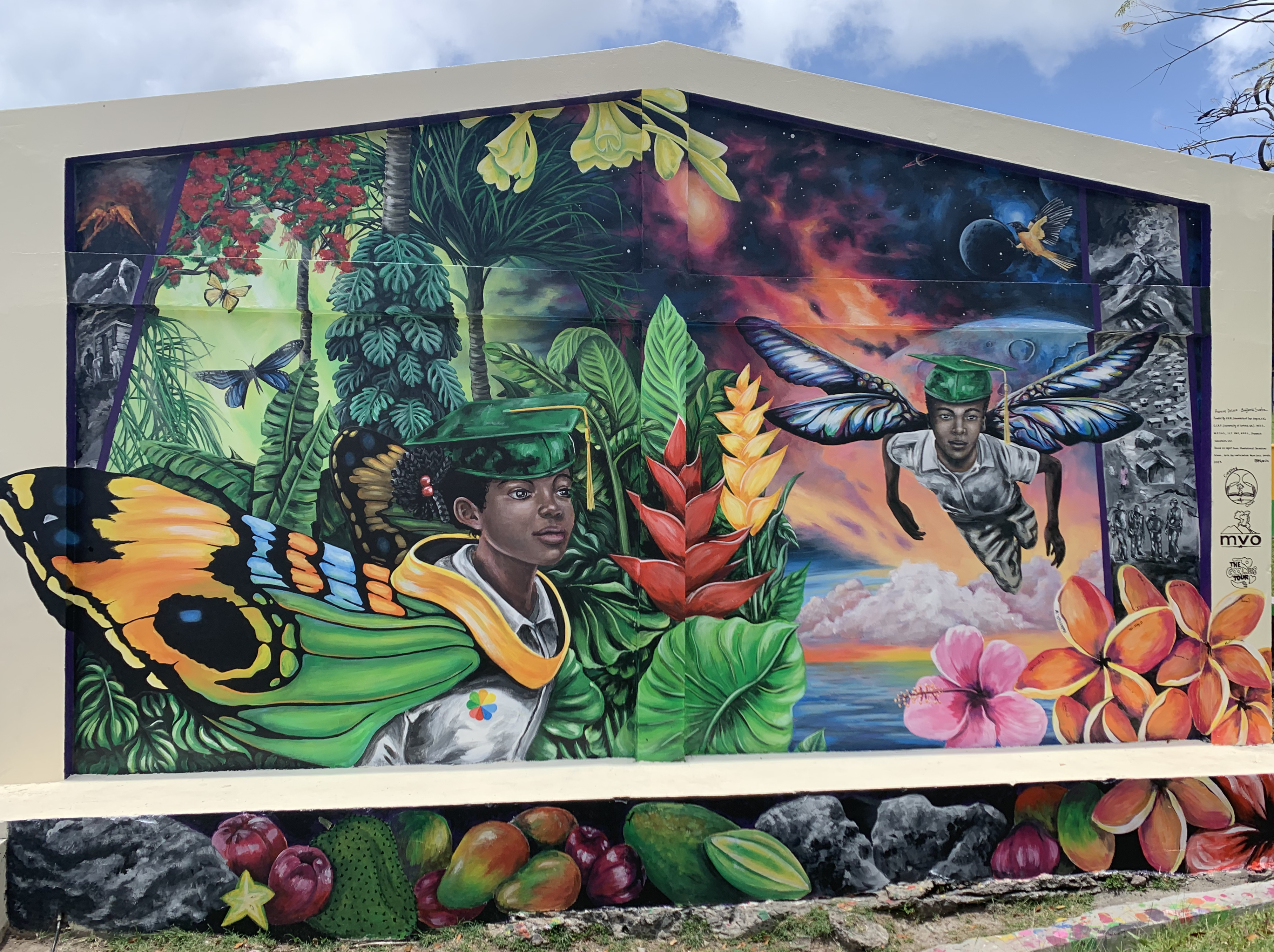 Mural of boy and girl surrounded by plants with volcano in the background