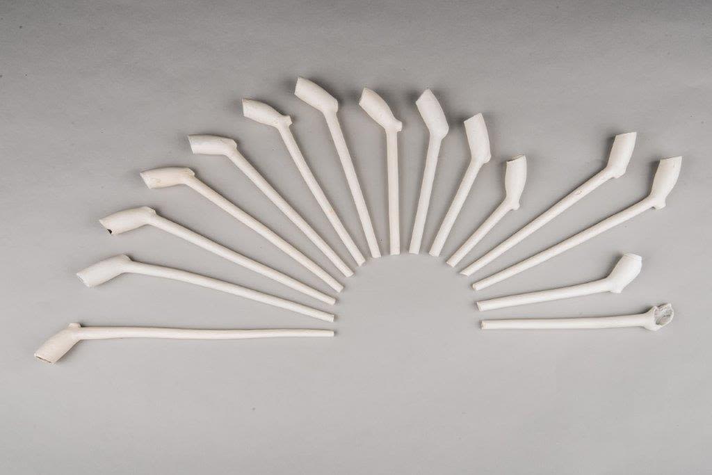 Clay pipes in a sunburst formation