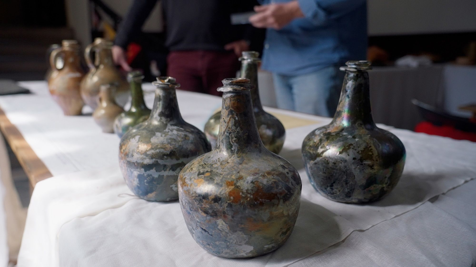 old wine bottles with wide base and narrow spout