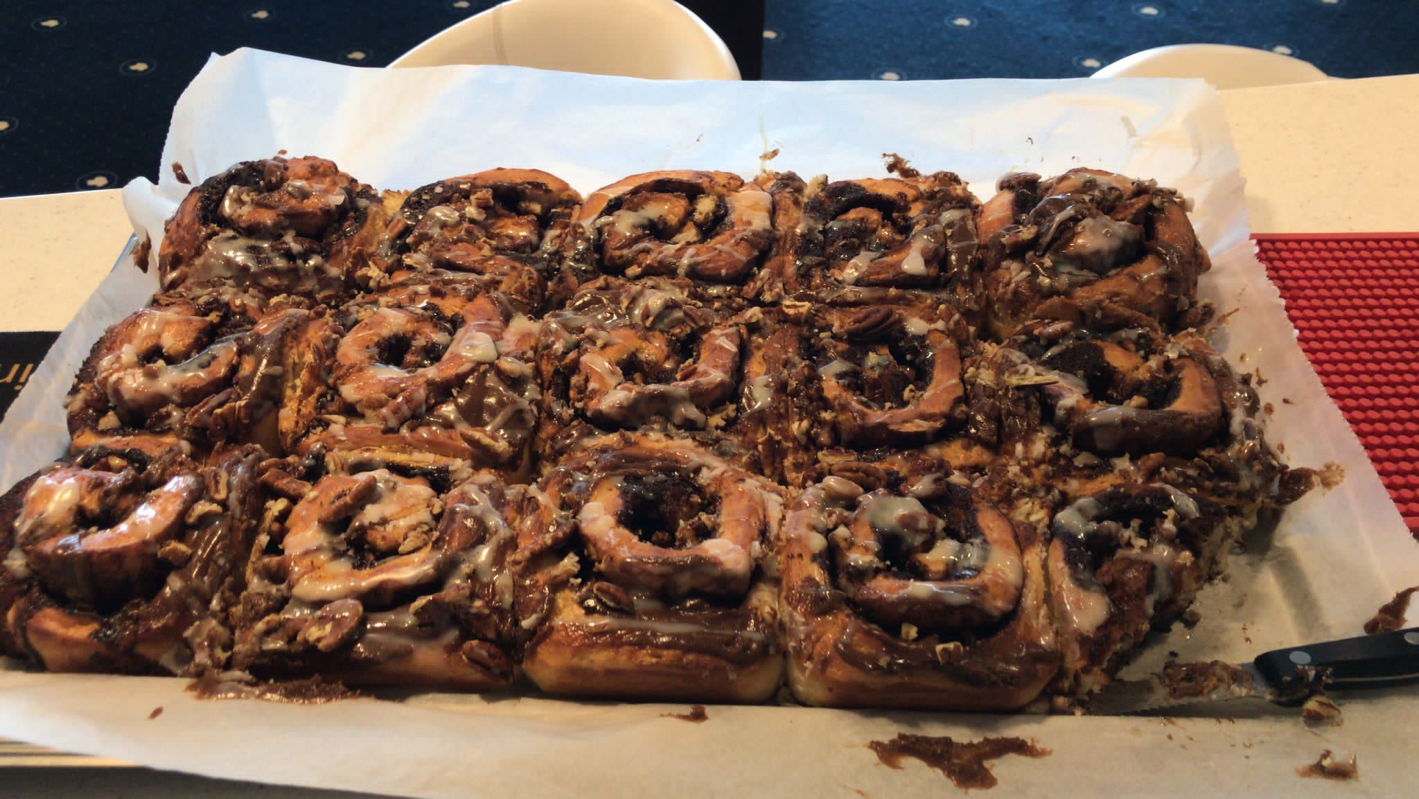 A tray of cinnamon rolls.