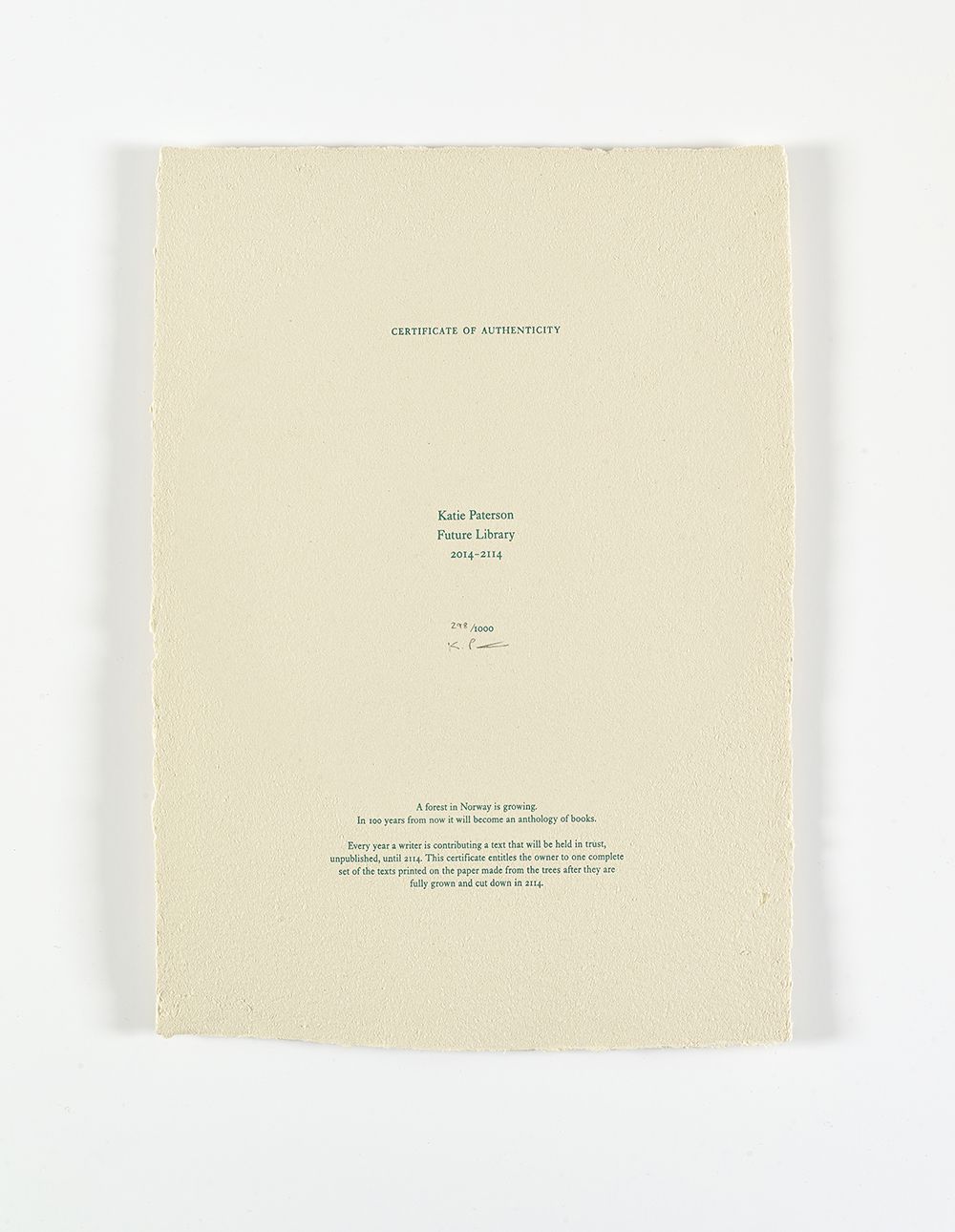 A photo of a paper certificate with information about the Future Library project in Norway.